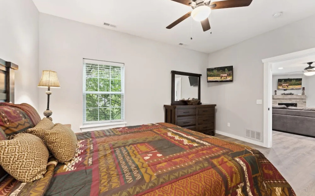 photo 4 of Whispering Woods Lodge-sleeps 10 4 Bedroom Home by RedAwning