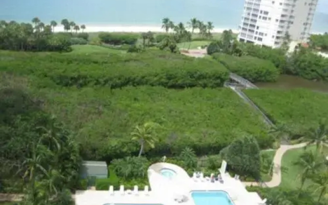 photo 4 of Luxurious Condo with Pool and Hot Tub Just a Walk to the beach by RedAwning